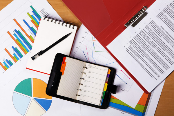 depositphotos 5729029 stock photo work table covered with documents